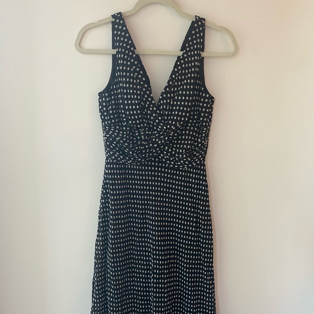 Black Sleevless Dress With White Polka Dots